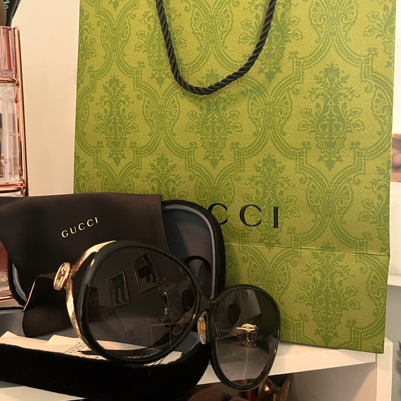 Gucci women’s sunglasses brand new never been worn no scratches on the lenses .